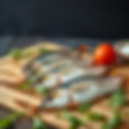 Fresh sea bass fillets displayed on a wooden cutting board