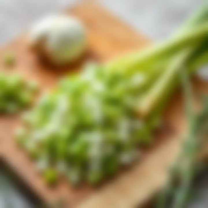Freshly chopped leeks on a wooden cutting board